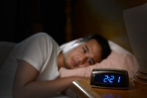 man suffering from insomnia needing psychologist gold coast help